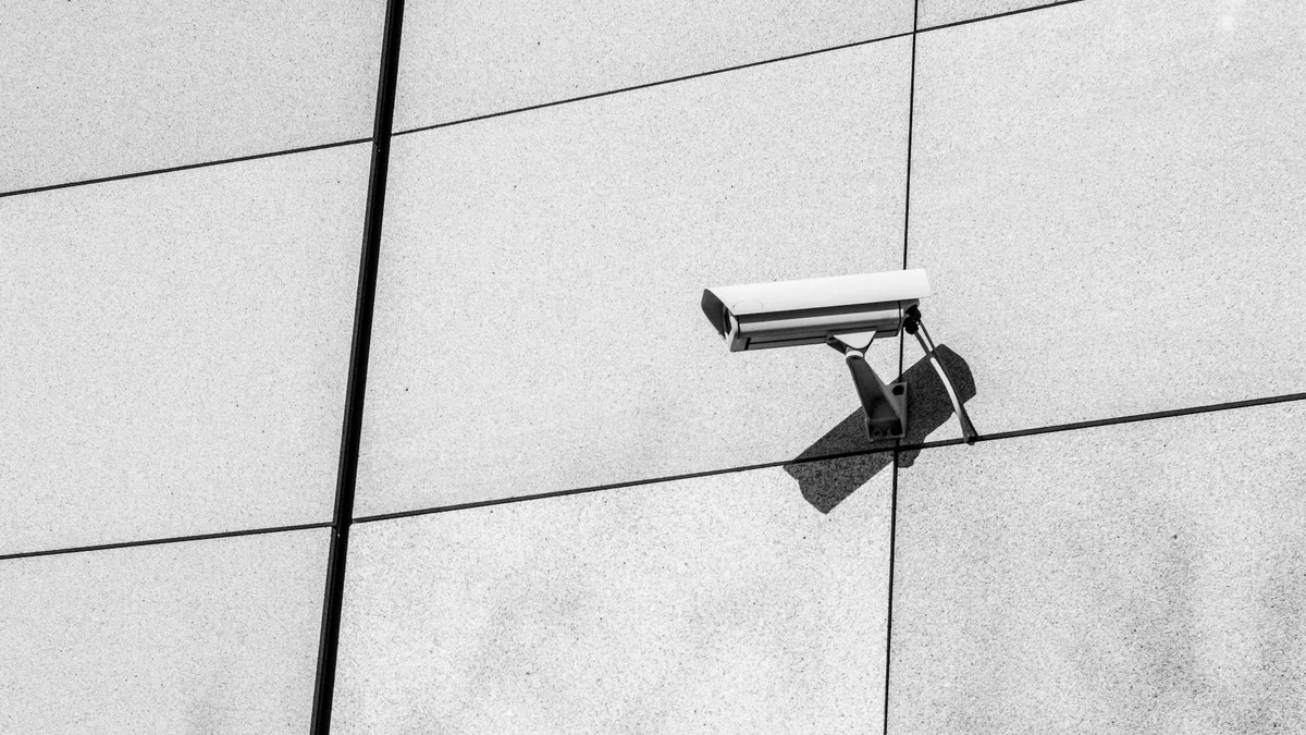 A security camera mounted on a building exterior