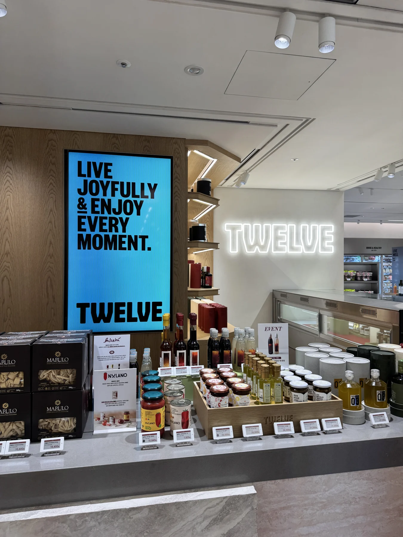 A curated display of pantry products inside TWELVE.